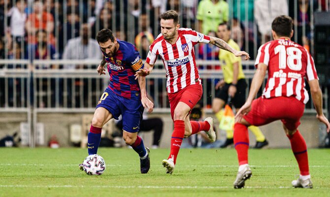 Messi y Saúl en un Barcelona vs Atlético de Madrid