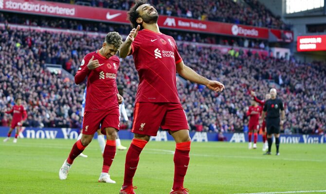 Mohamed Salah celebrando un gol anotado. Cuotas Liverpool vs Atlético de Madrid, Champions League.